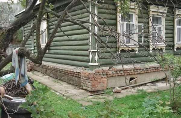 Подъем деревянного дома - фото